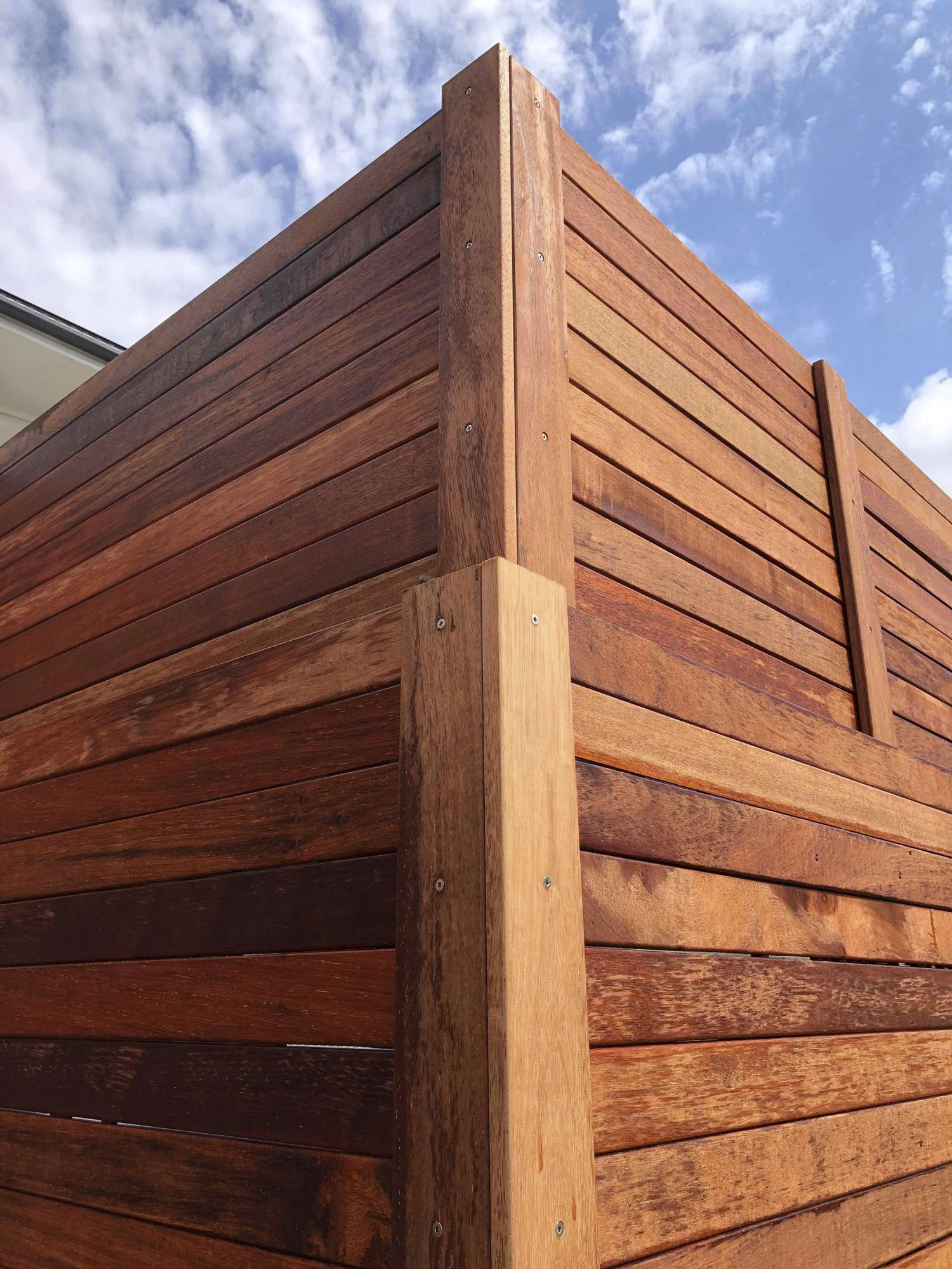 Solid timber fencing ideas for landscaping on the Gold Coast.